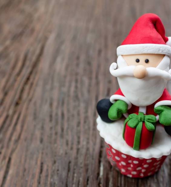 stock-photo-christmas-theme-cup-cake-on-wooden-background-528695395-transformed