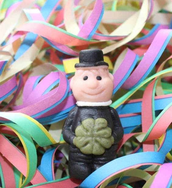 stock-photo-marzipan-chimney-sweep-in-paper-streamers-1878576241-transformed